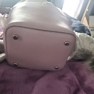 This is a new Kate Spade with tags